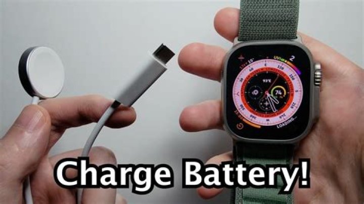 How do I turn on my Apple watch after charging?