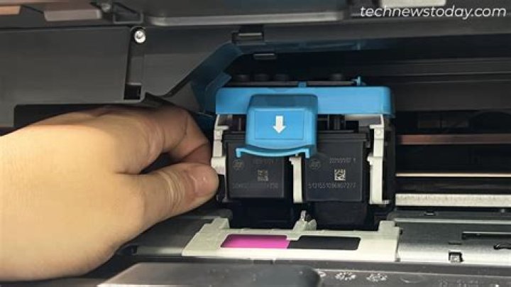 How do you change the ink in a HP Officejet 63?